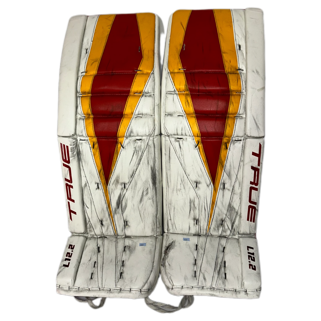 TRUE L12.2 - Used Pro Stock Goalie Pads (White/Red/Yellow)