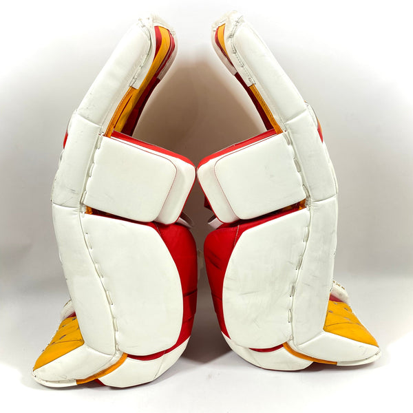 CCM Extreme Flex 5 - Used AHL Pro Stock Goalie Pads (White/Red/Yellow)